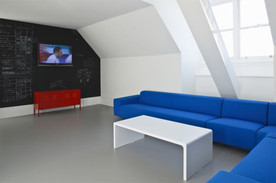 Beautiful Office Room With Blue Sofa by Jump Studios
