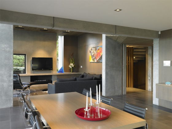 New Zealand House Interior with The Design is Composed of a Collection of Interlocking Concrete Box Forms by Stevens Lawson