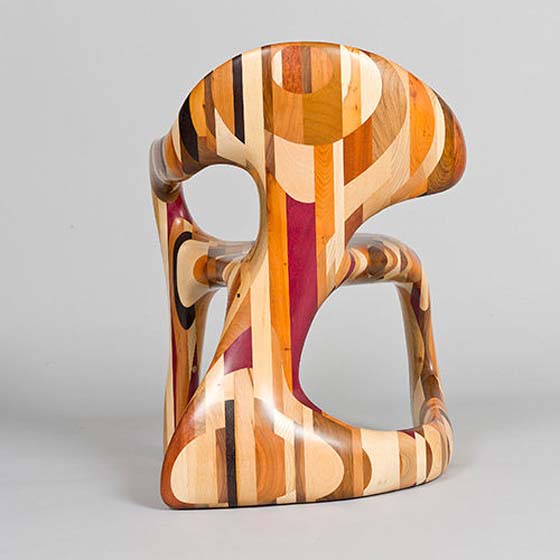 Artistic and Smooth Curves of Corsica Chair by Ian Spencer and Cairn Young back view